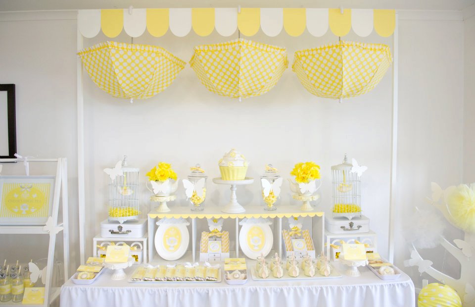 Yellow and white birthday party dessert table