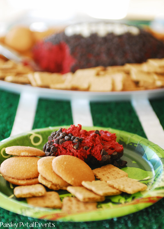 Serving of football red velvet cheese ball