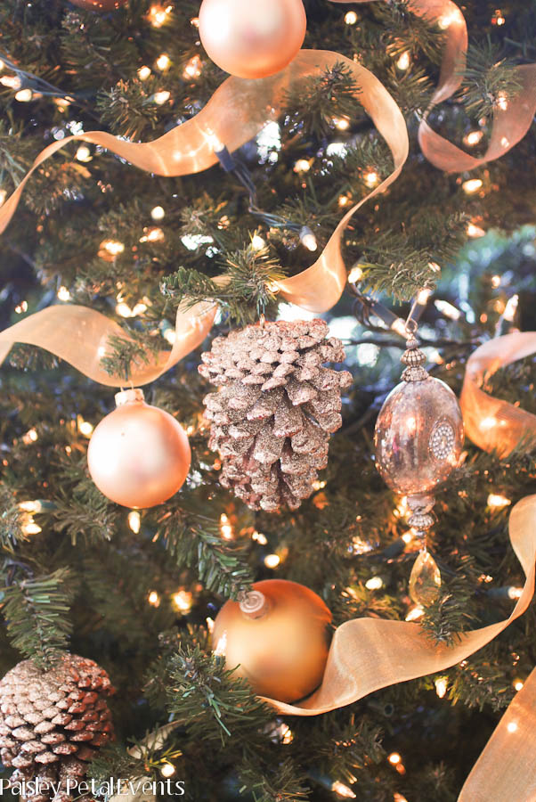 Glitter pinecone ornaments on tree