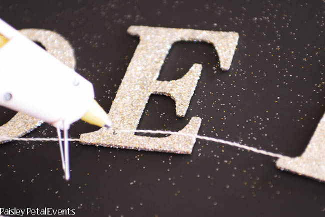 simple glitter letter garland glueing