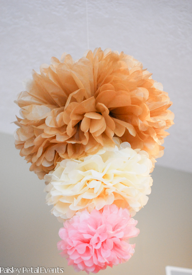 Large hanging tissue pom made from 3 sizes of poms