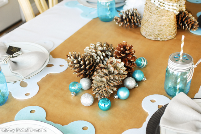 Easily entertain in style by using wrapping paper for an inexpensive tablerunner.