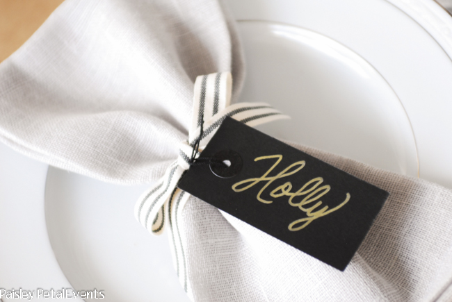 Simple handwritten namecards make guests feel welcome at your holiday party.