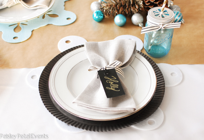 Rustic Glame Tablescape for the holidays. A namecard at each place setting makes guests feel welcome.