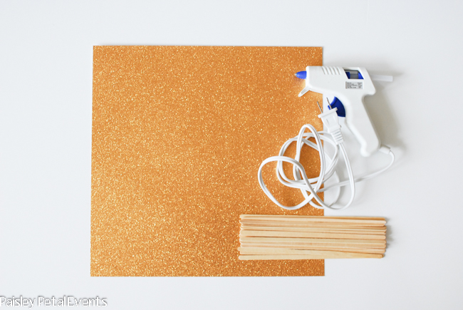 Supplies to make gold glitter bow cupcake toppers